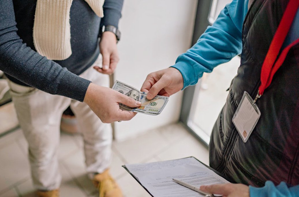 Close up of a Person Paying