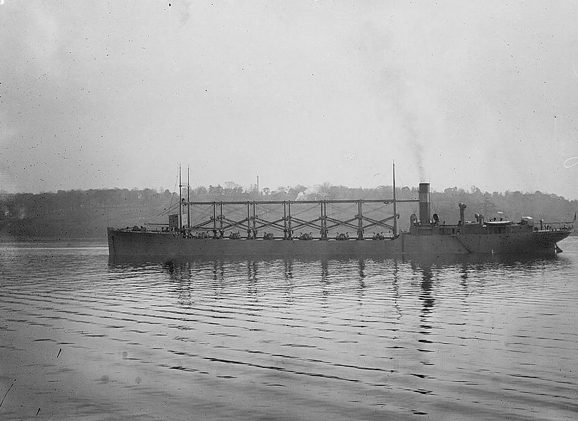Grayscale Close Up Photo of USS Cyclops in motion