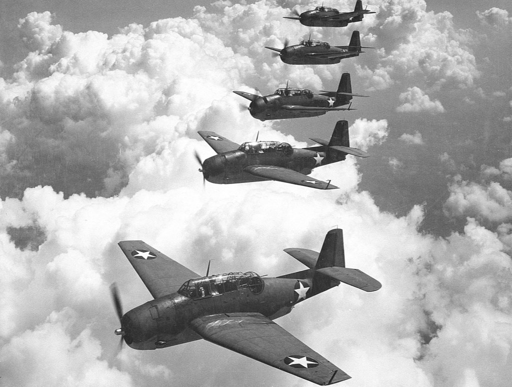 Five U.S. Navy Grumman TBF-1 Avengers from Escort Scouting Squadron flying