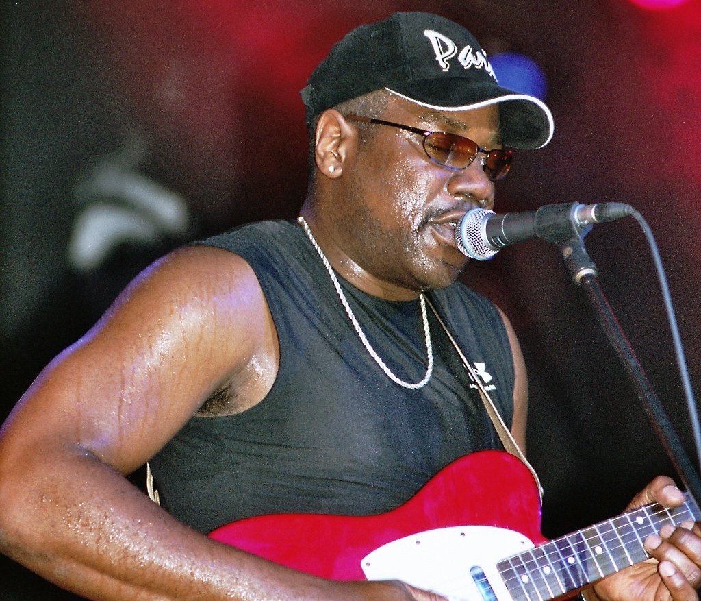Big Bill Morganfield on stage playing guitar