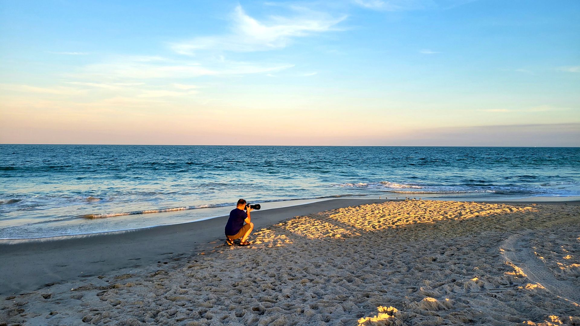 File:Photographer in action at South beach in Vero Beach, Florida (2023).jpg