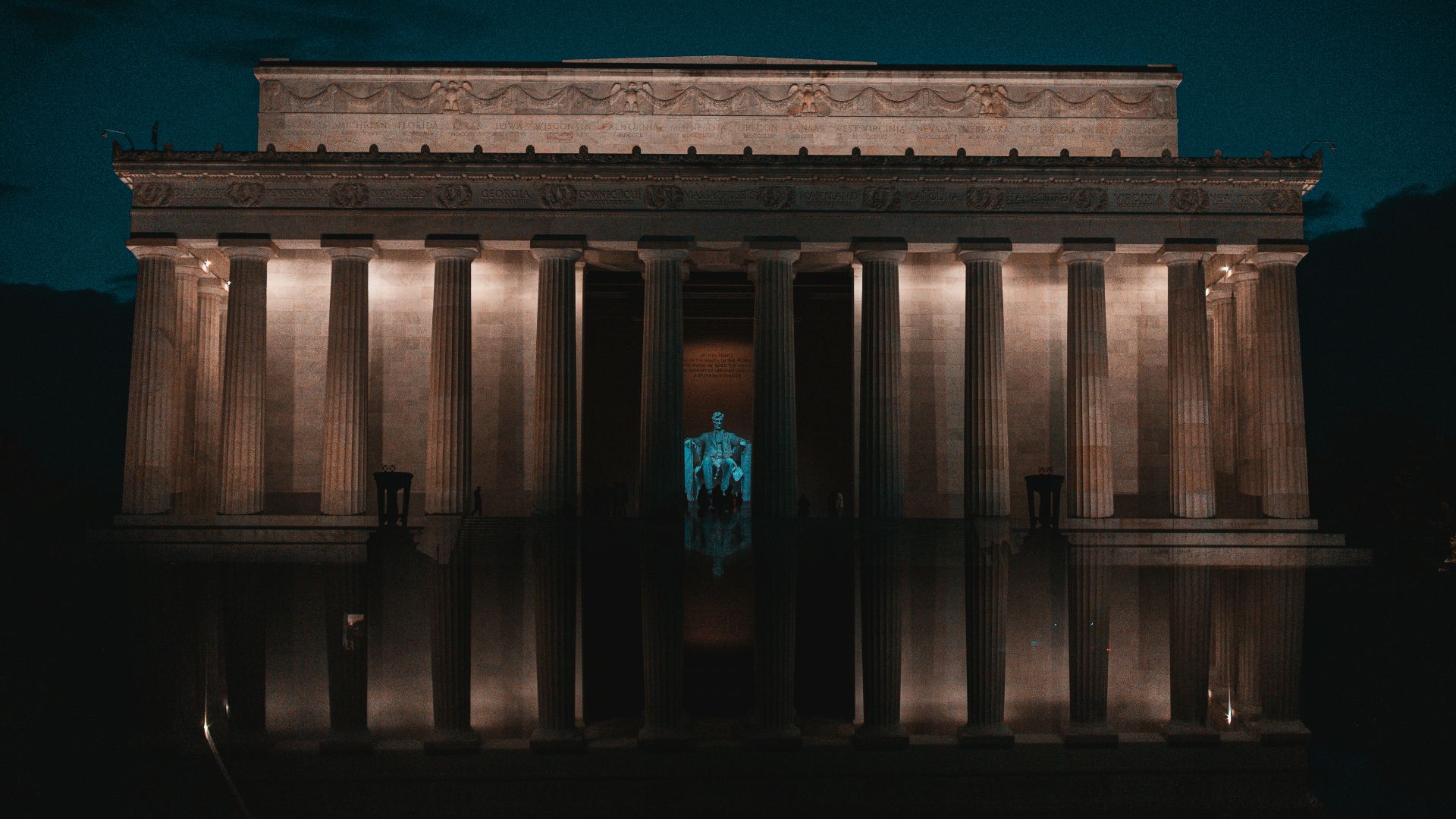 brown concrete building under blue sky during daytime