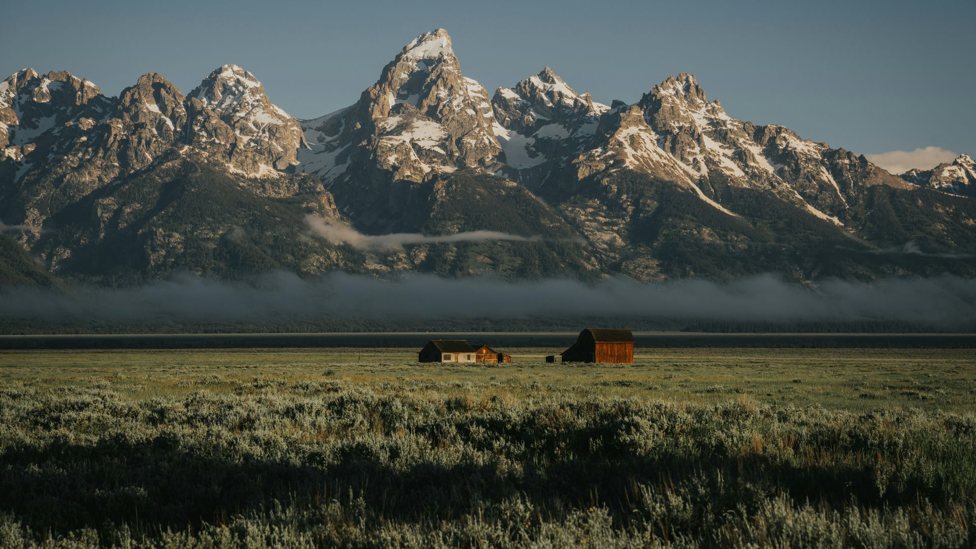 brown and white mountains under blue sky during daytime