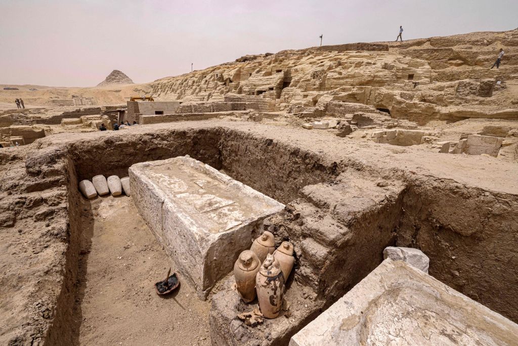 Visitors tour the site in the Saqqara necropolis