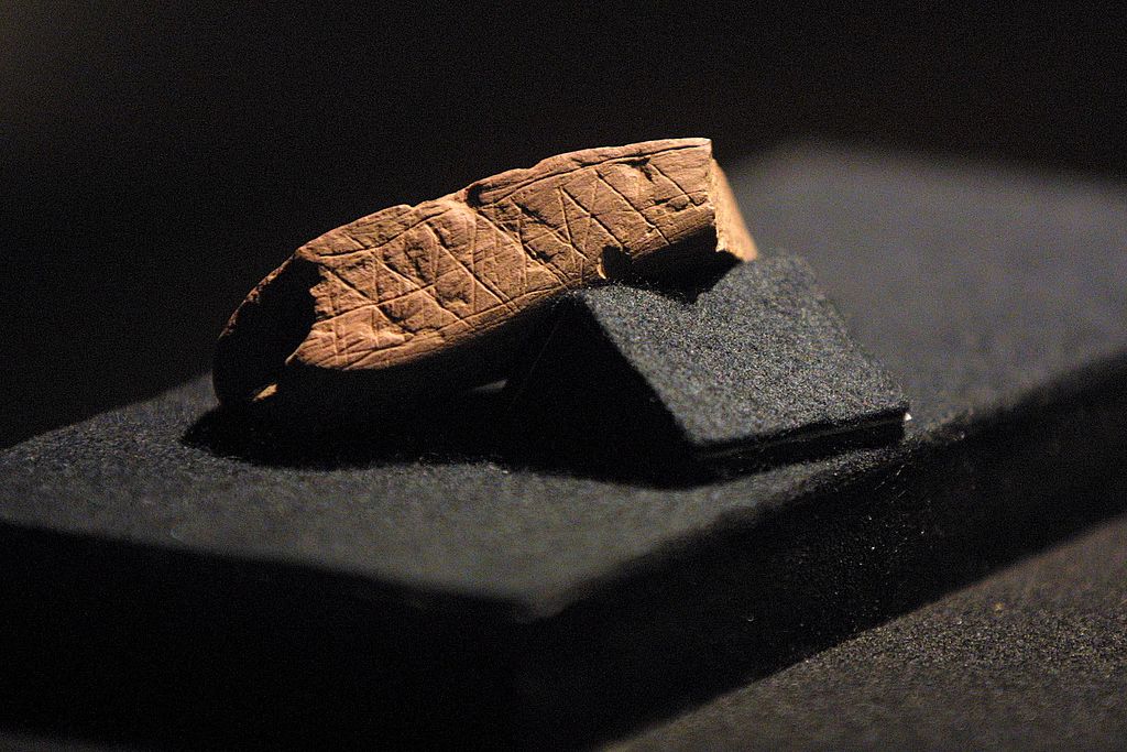 A piece of red ochre with a deliberately engraved design