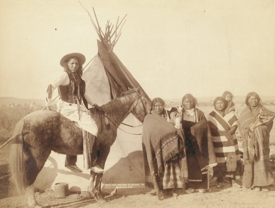 A Pretty Group at an Indian Tent
