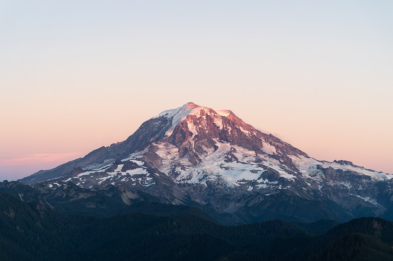 Mount Rainier's northwestern slope viewed aerially just before sunset