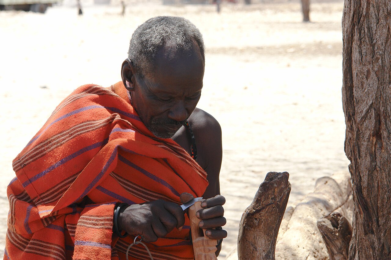 Samburu Man Carving Wood