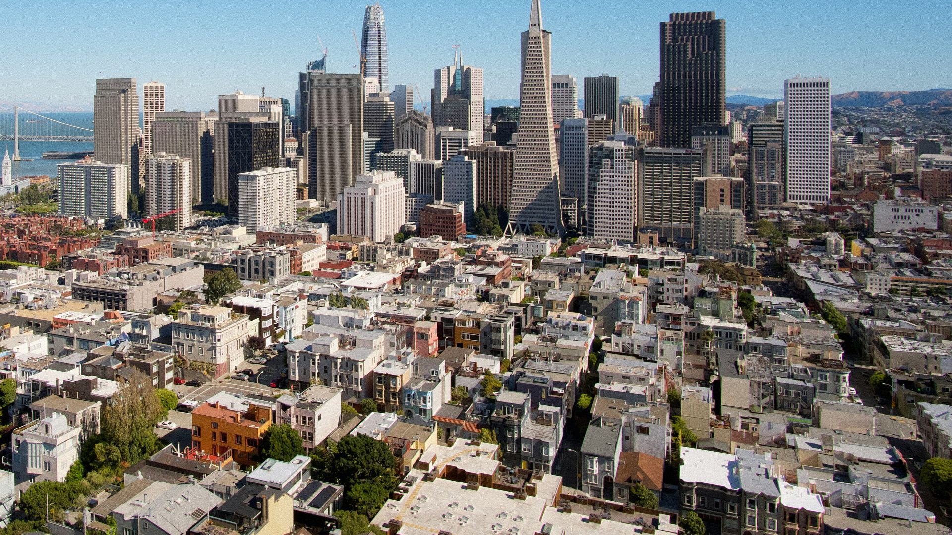 city buildings under blue sky during daytime