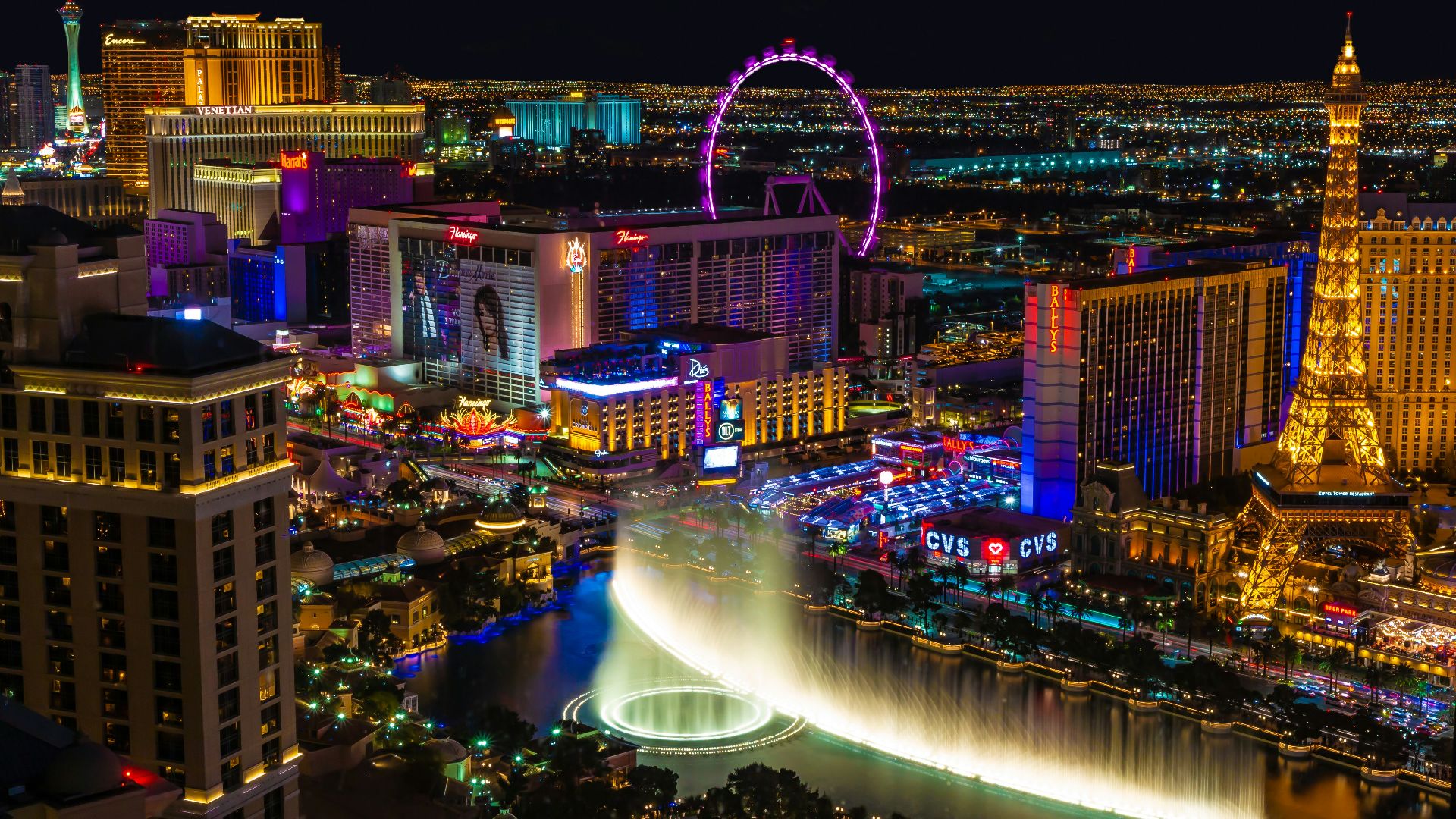 city with lights turned on during night time