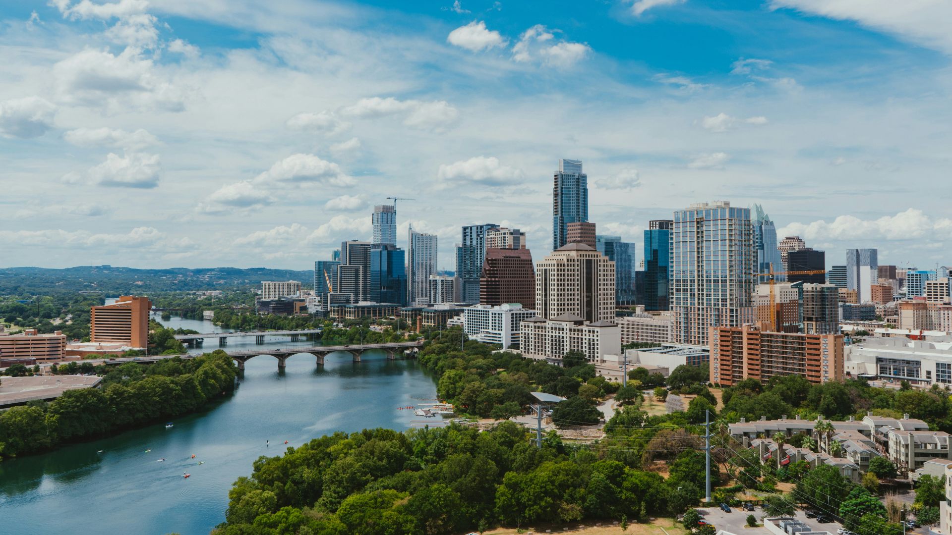 river near buildings during daytime