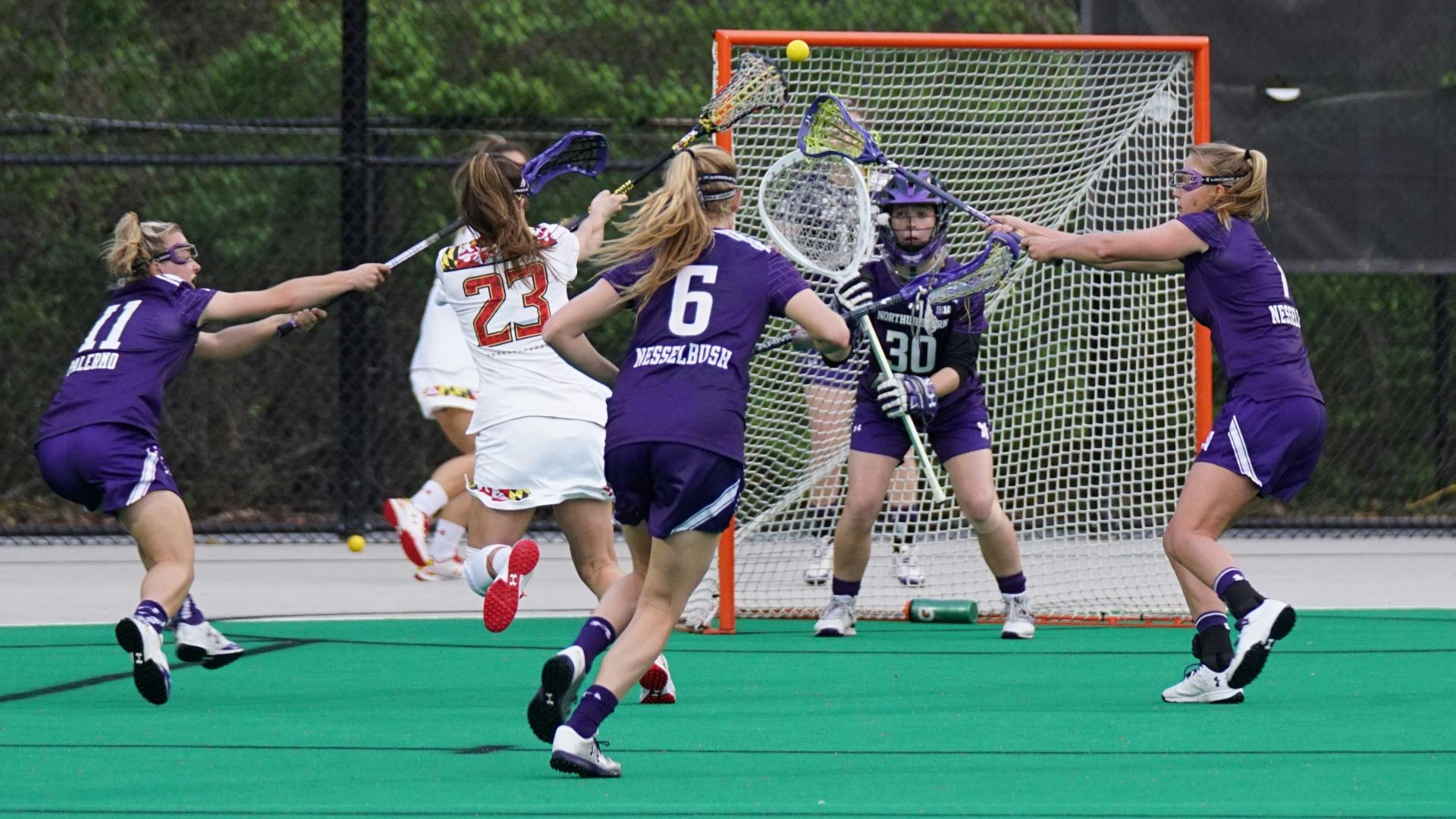 women playing lacrosse