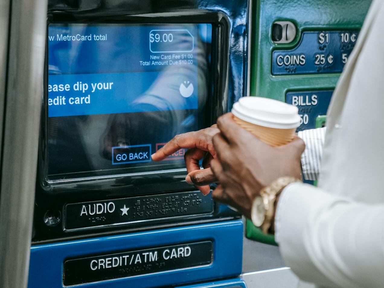 Person using an Automated Teller Machine