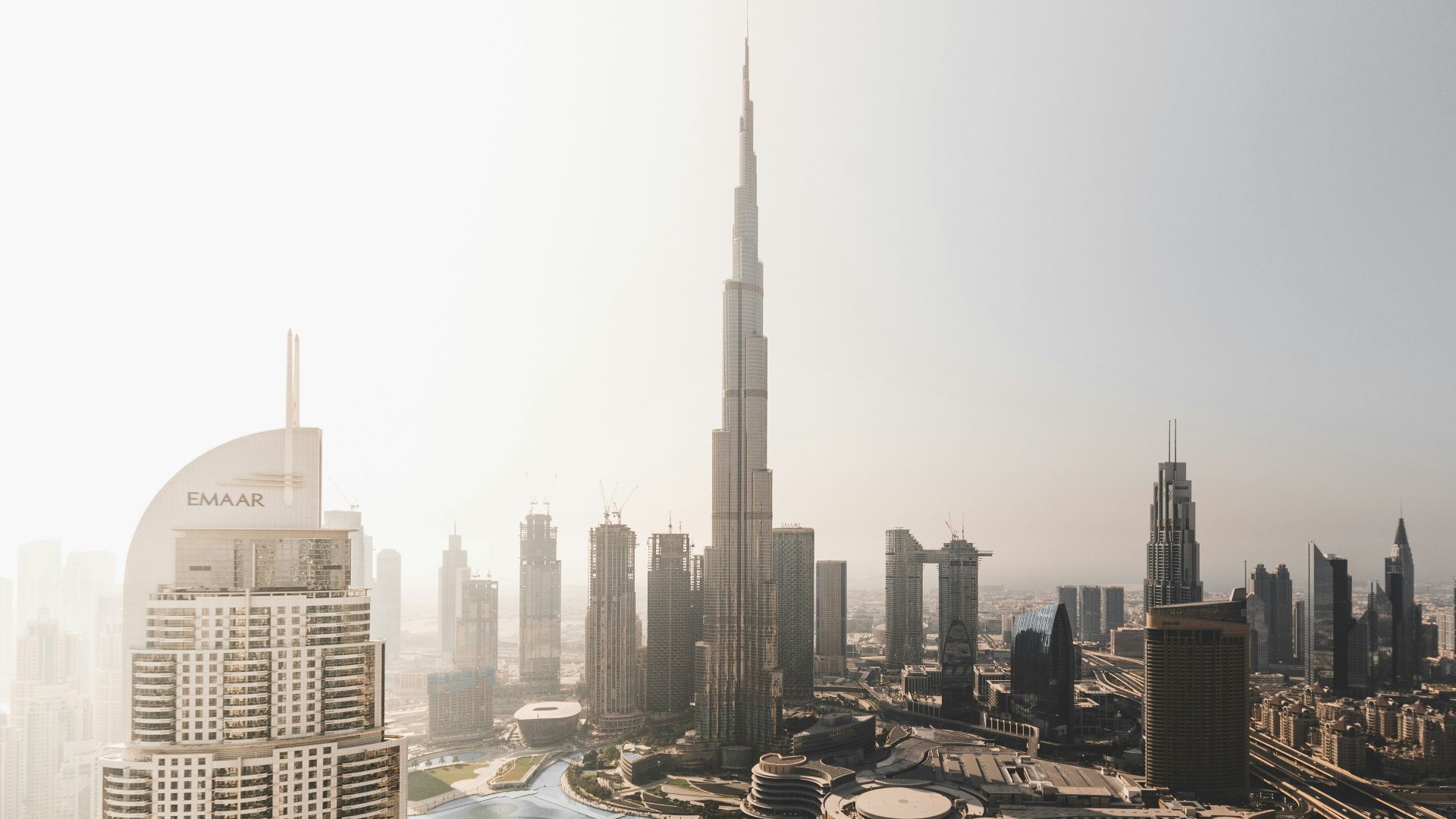 high rise buildings near body of water during daytime