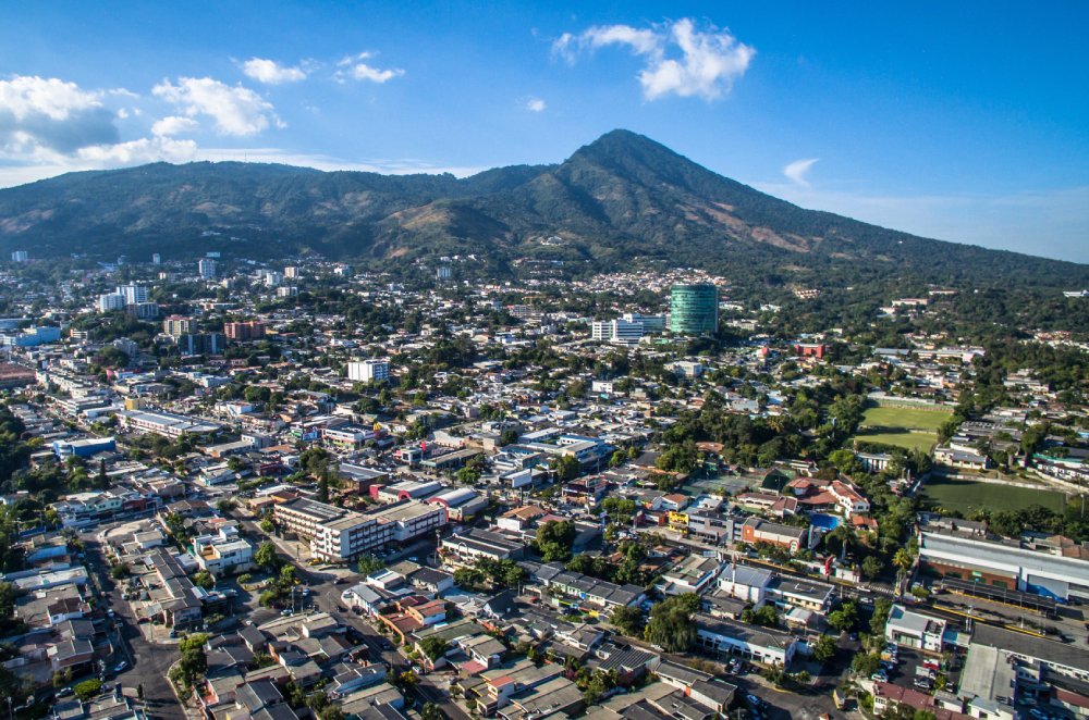 The image showcases a Vibrant urban scene of San Salvador, El Salvador