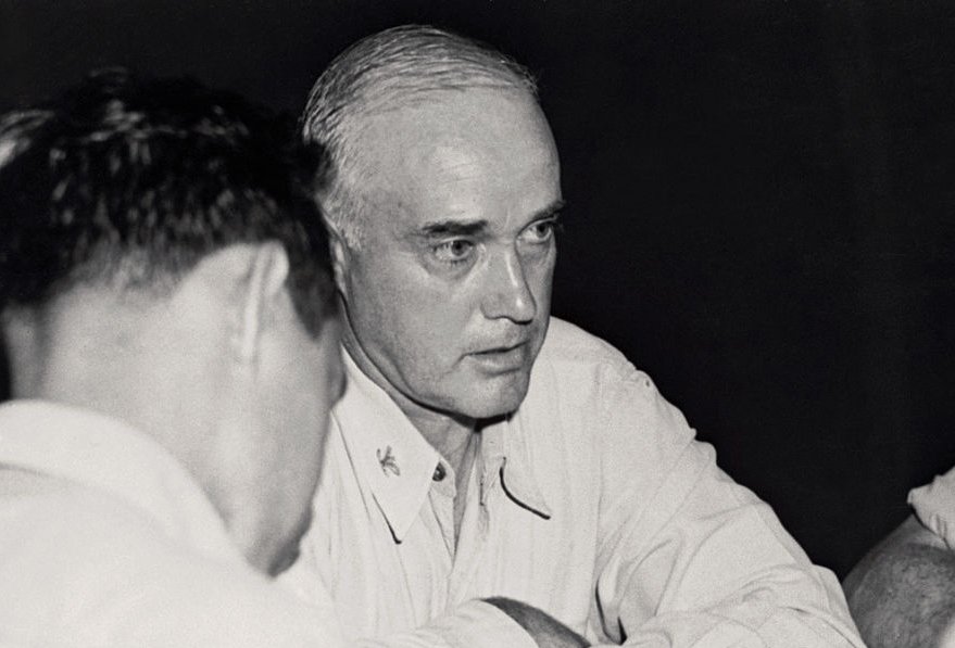 Charles McVay Speaking to War Correspondents