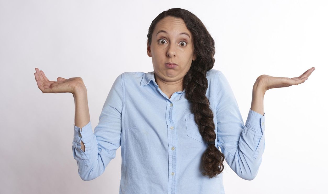 Confused, hands-up, unsure, perplexed lady