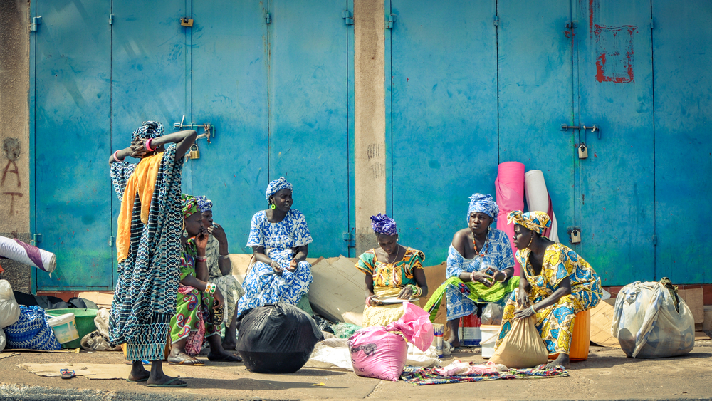 Women waiting in the port of the Gambia