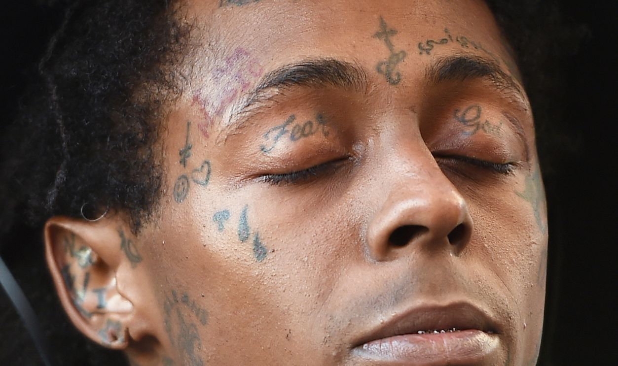 LAS VEGAS, NV - SEPTEMBER 06: Rapper Lil' Wayne, tattoo detail, waits to perform at Foxtail Pool at SLS Las Vegas on September 6, 2015 in Las Vegas, Nevada.