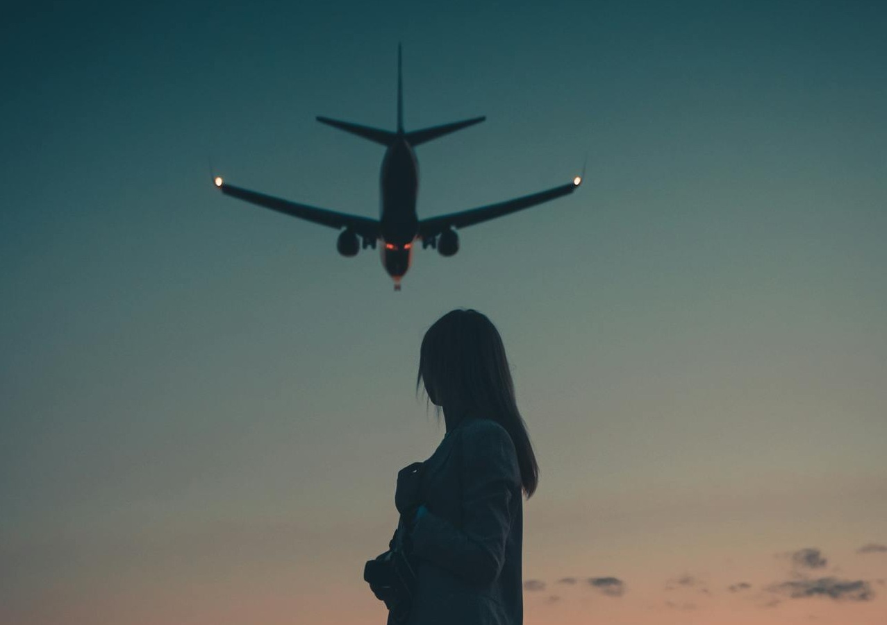 A Woman Standing on a Runway