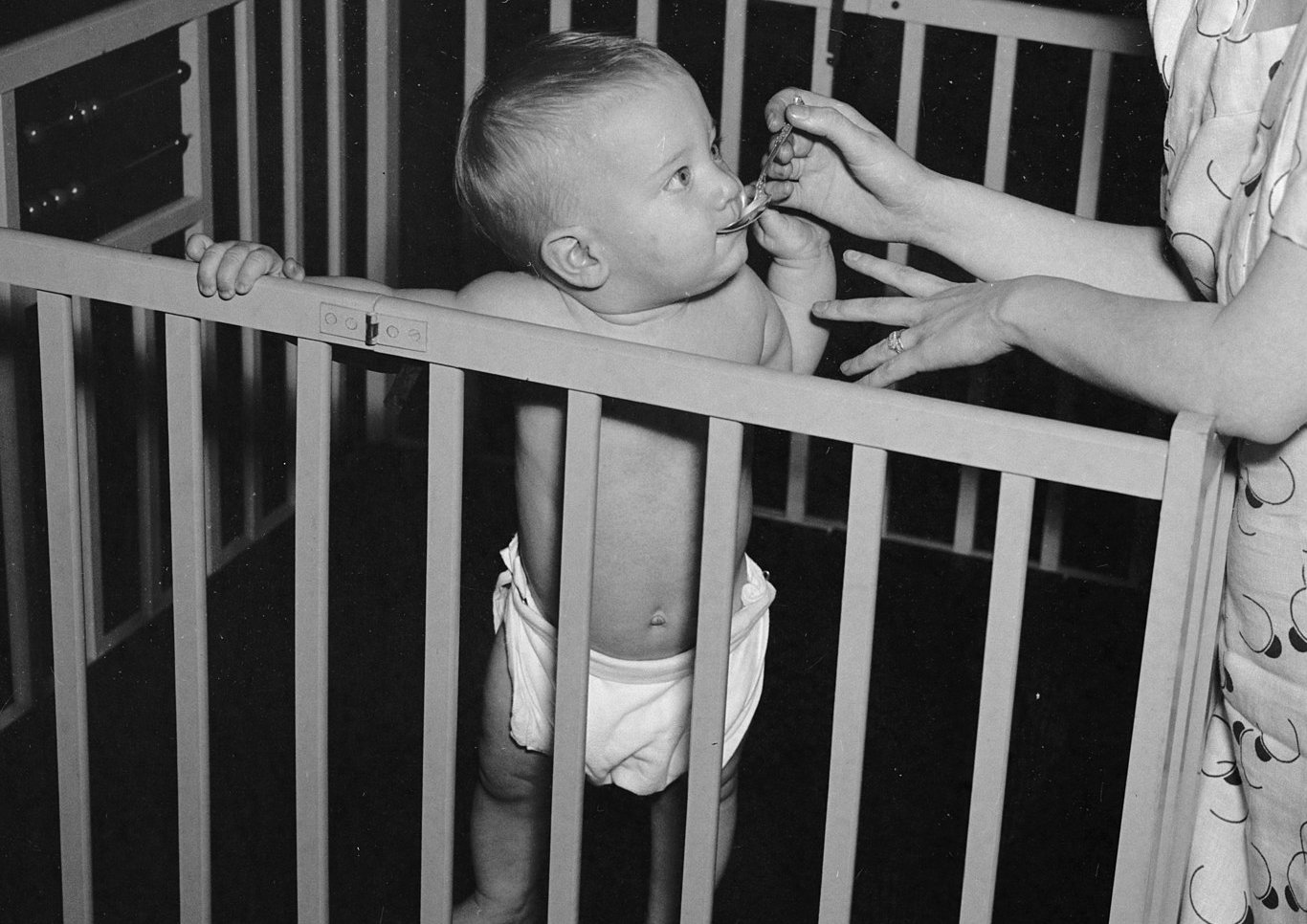 A Mother Feeding Her Baby in 1937