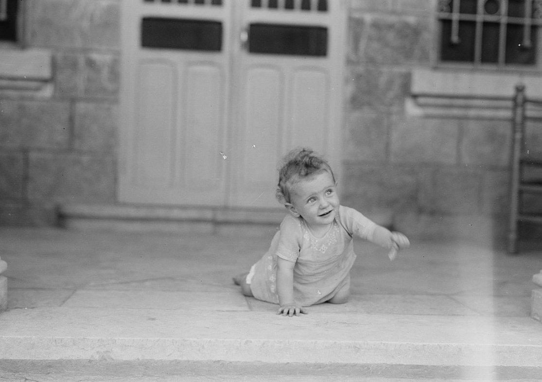 Baby on the porch in the 1930s
