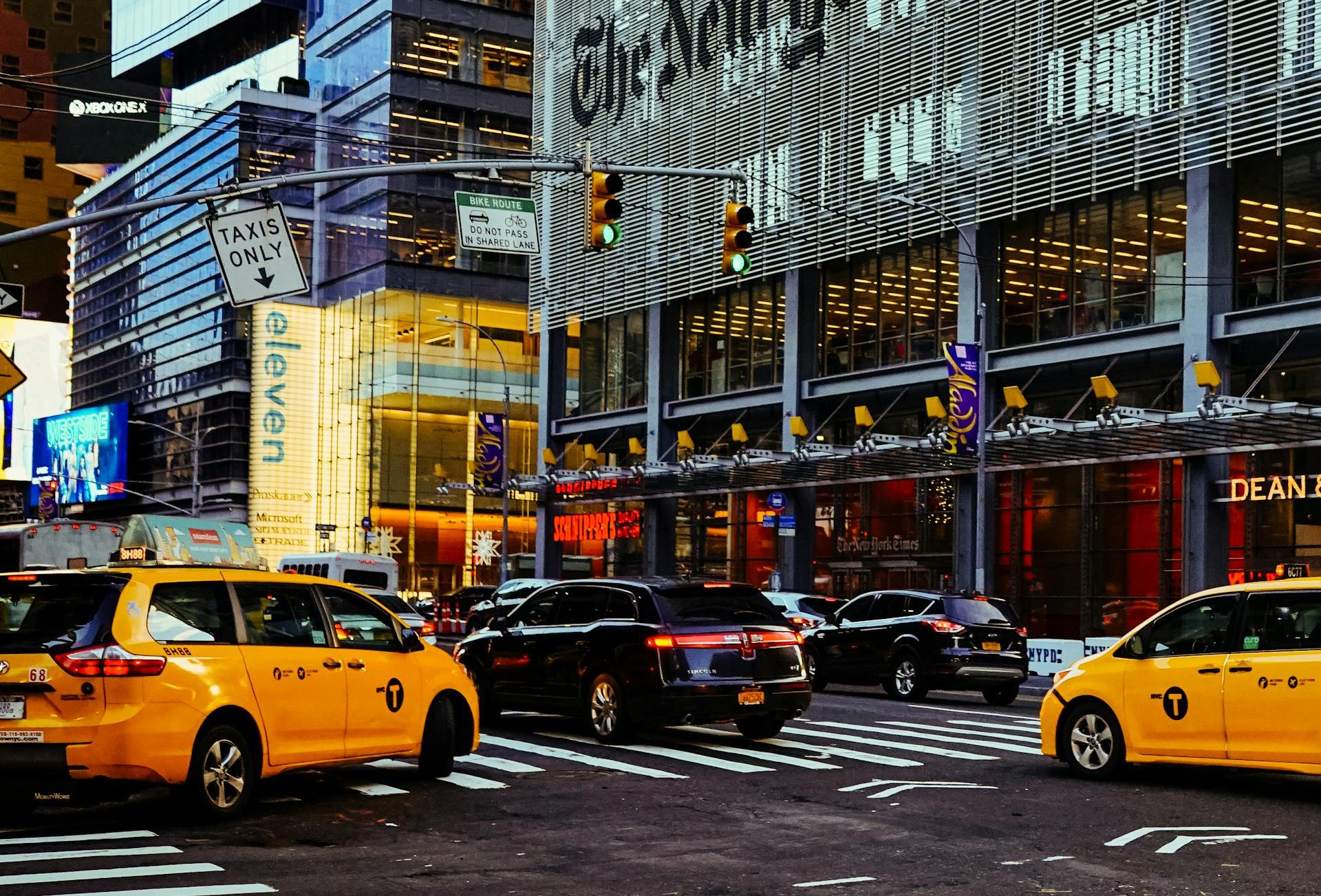 Yellow New York Taxi in front of New York Times Building