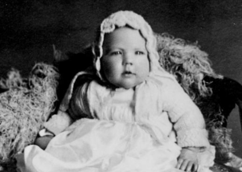 Studio Portrait Of A Baby On A Cushion, 1910-1920