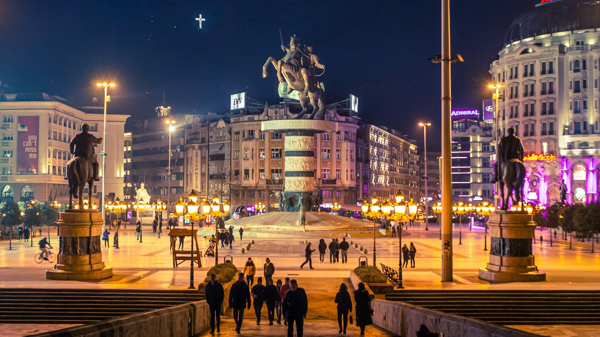 people walking on street during nighttime