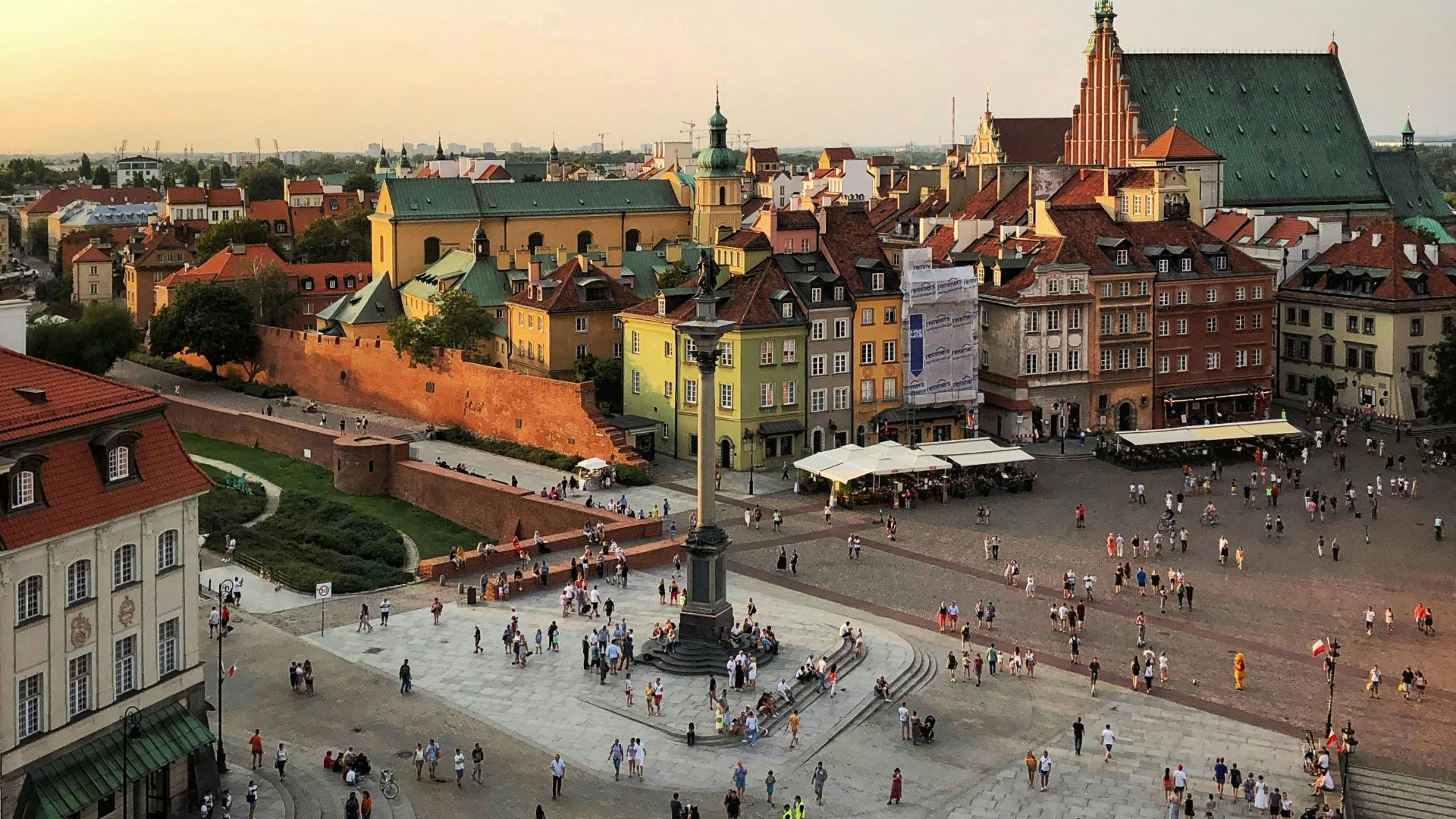 aerial photograph of people walking on town square