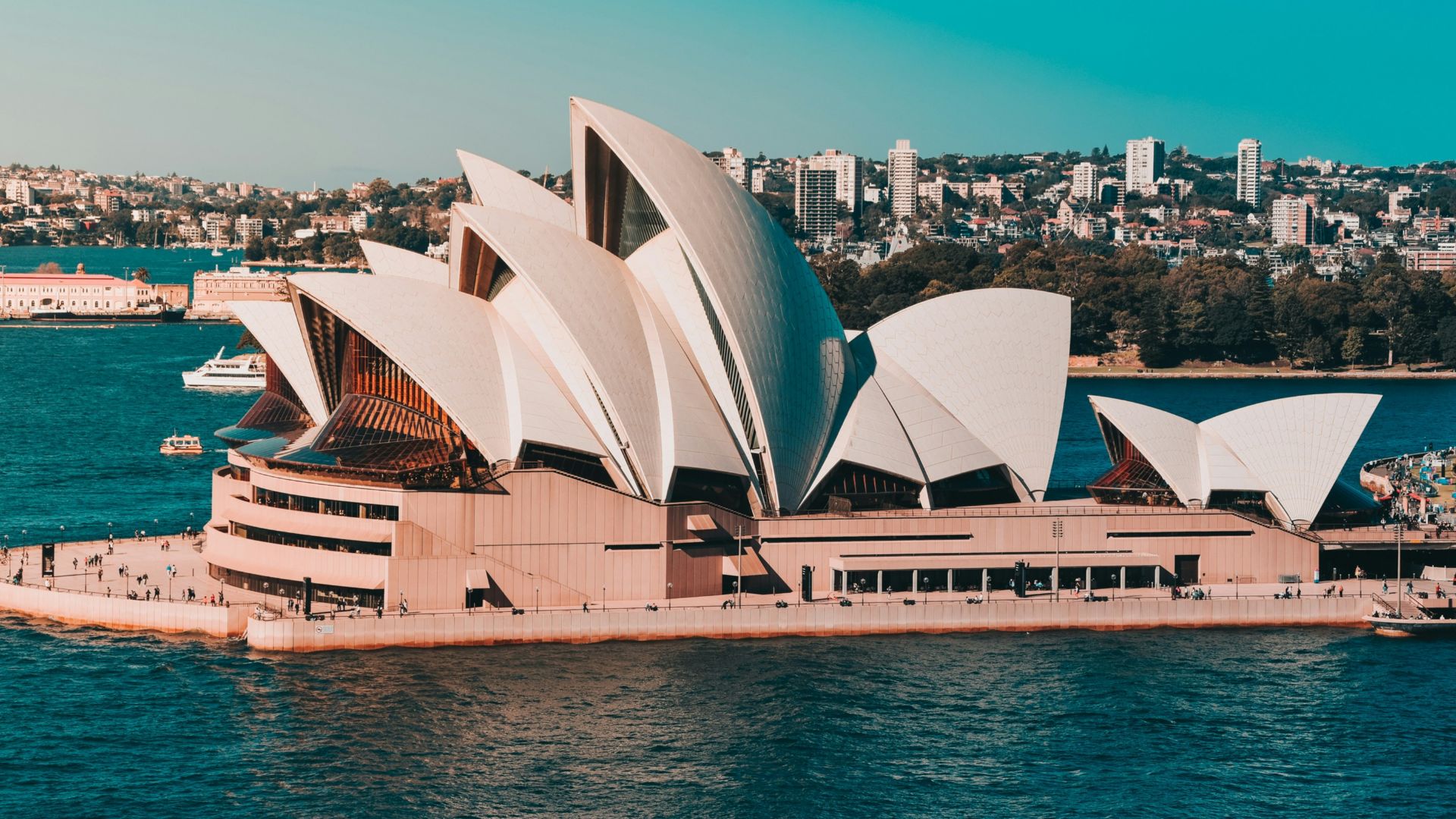 sydney opera house near body of water during daytime