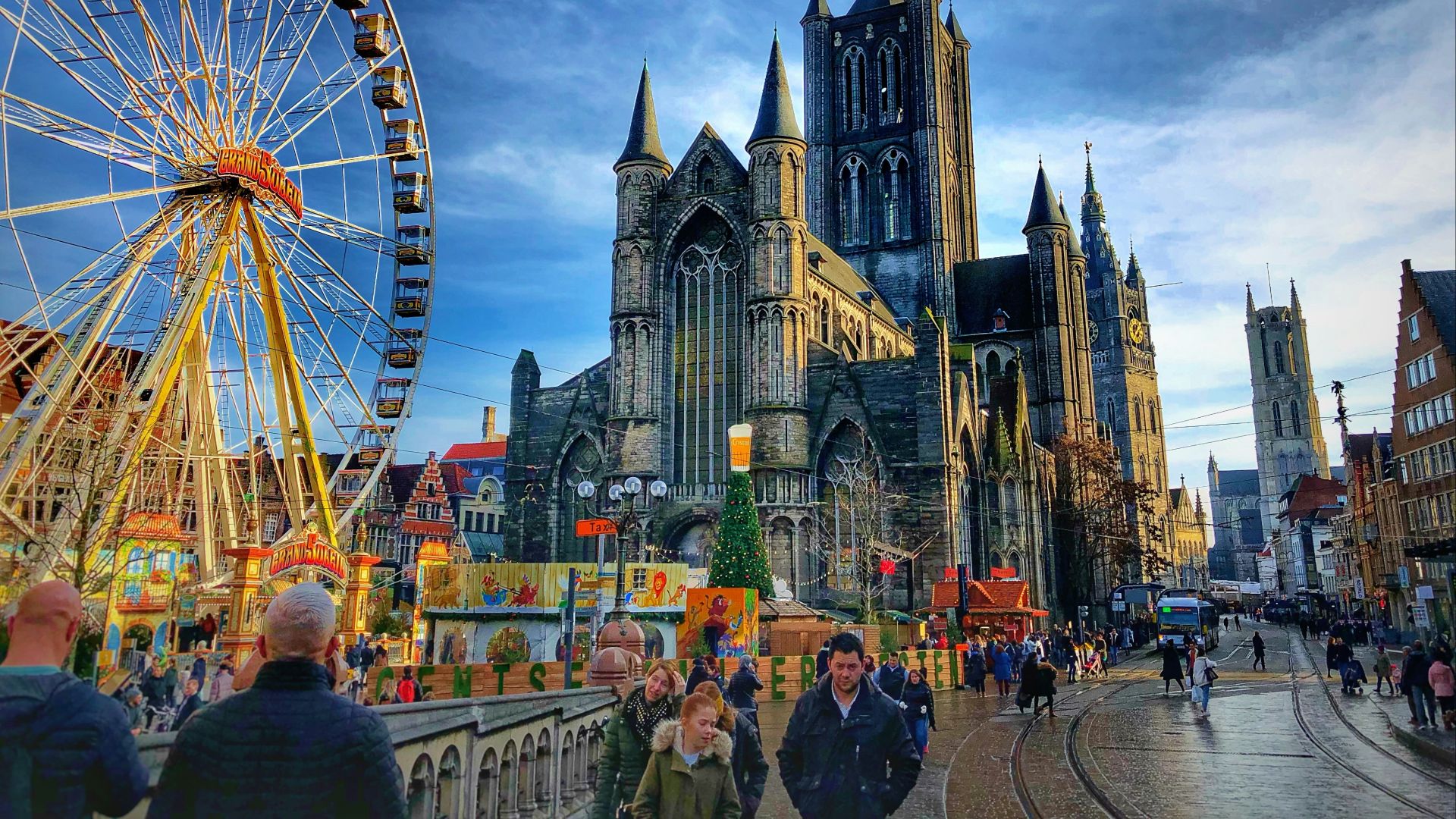 people walking near ferries wheel