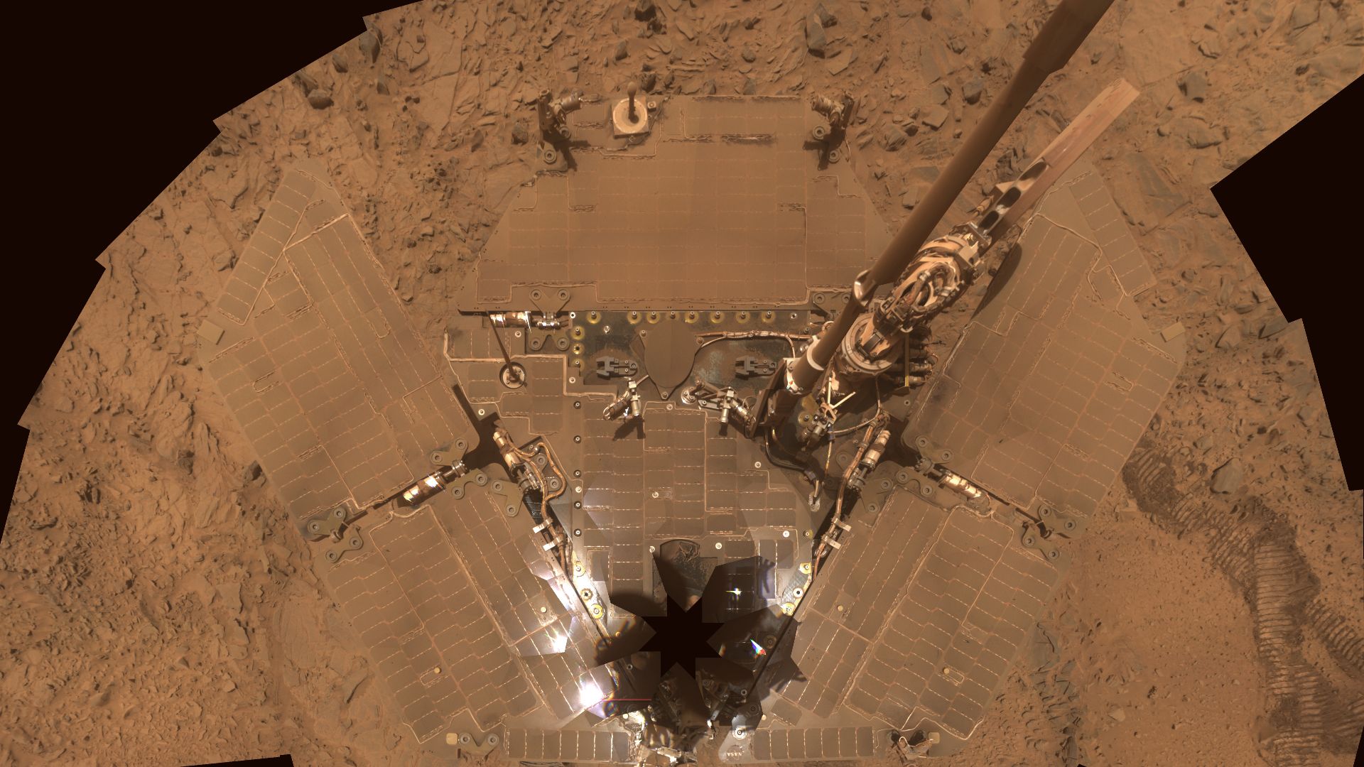File:Mars Spirit rover's solar panels covered with Dust - October 2007.jpg