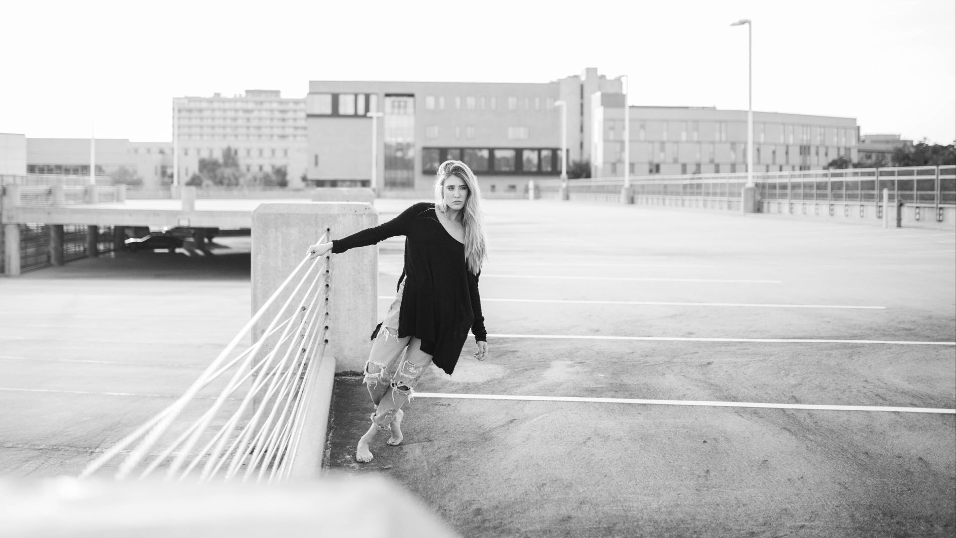 File:Woman poses in car park (Unsplash).jpg