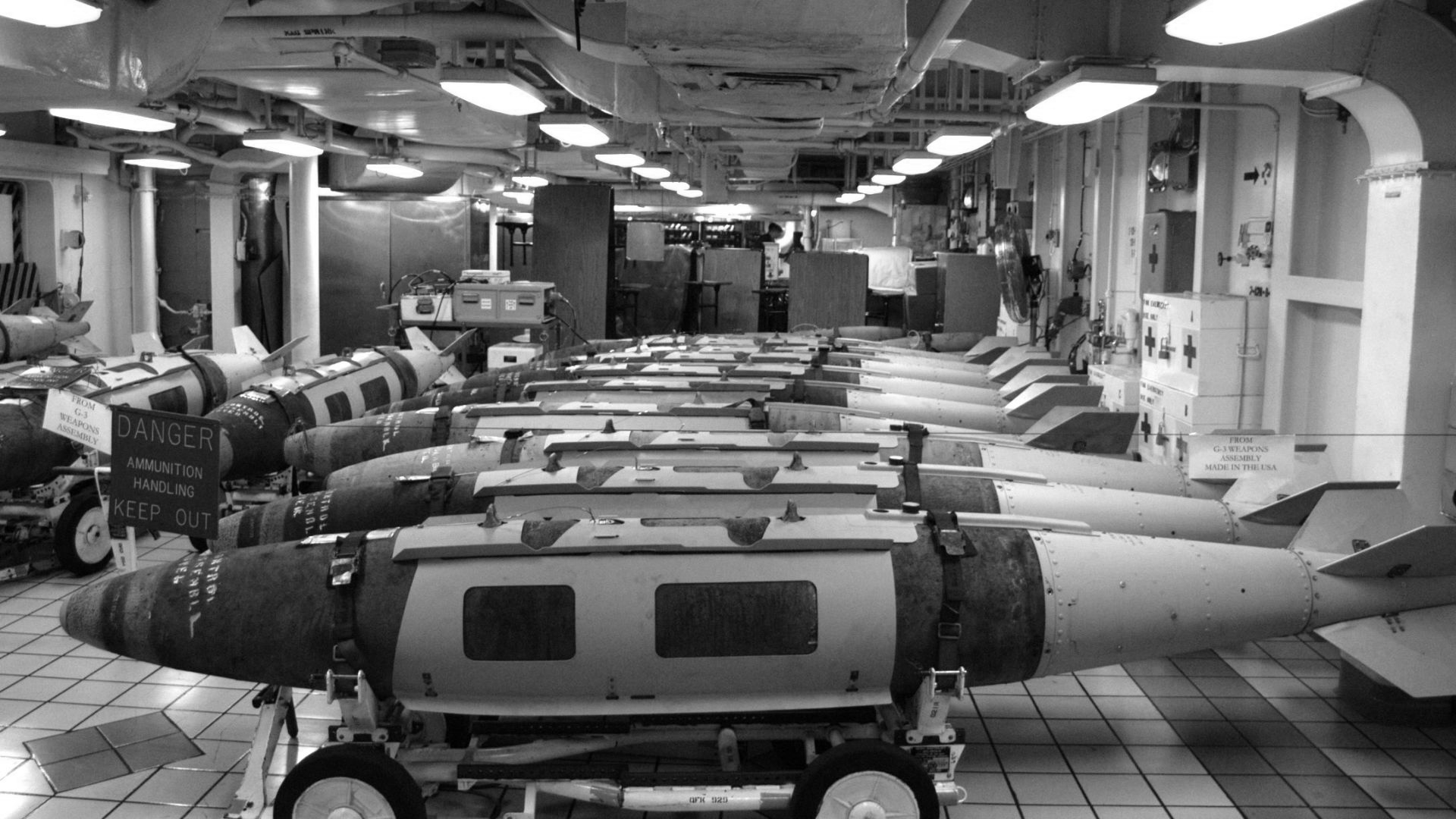 File:US Navy 030320-N-9228K-002 Joint Direct Attack Munitions (JDAM) sit on the mess decks in temporary storage prior to being moved to the flight deck to be loaded onto awaiting air wing aircraft.jpg