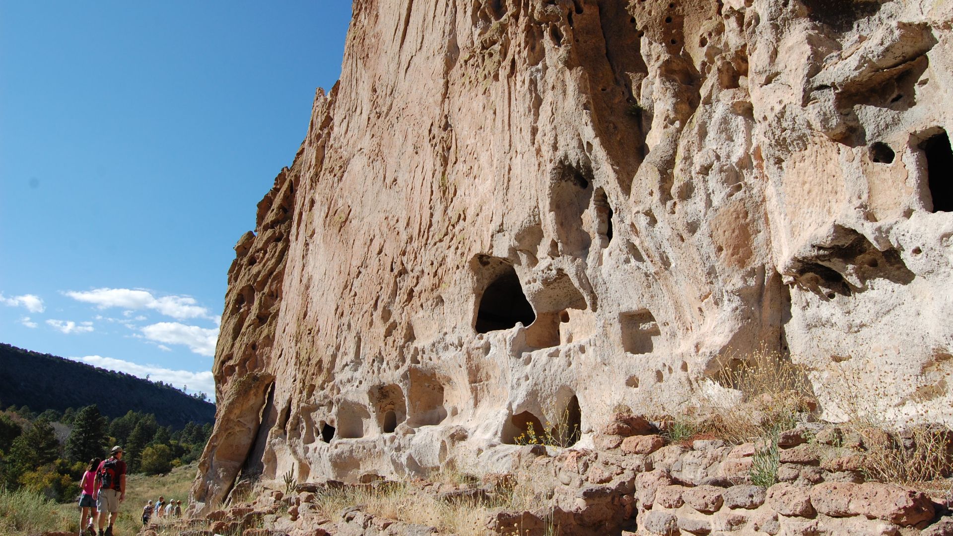 File:Walking along historic locations at Bandelier National Monument.jpg
