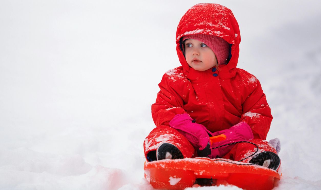 Baby wearing pink jacket