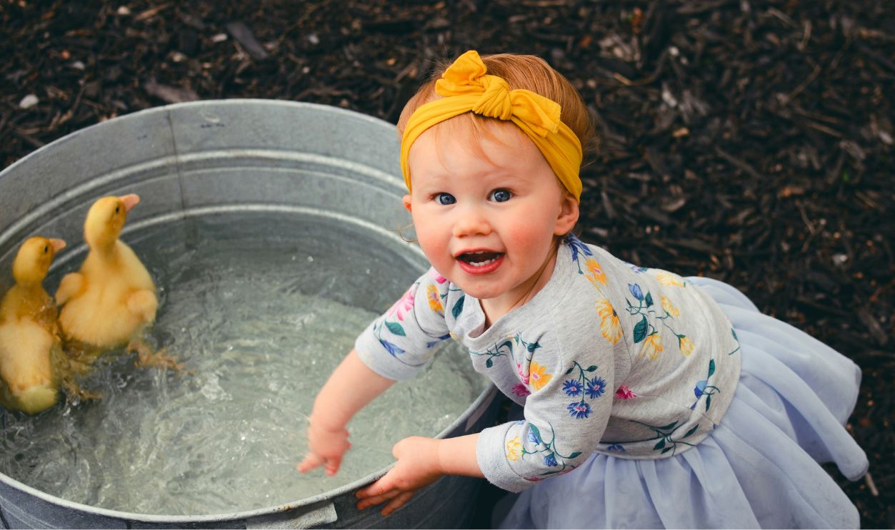 Baby girl in yellow headband