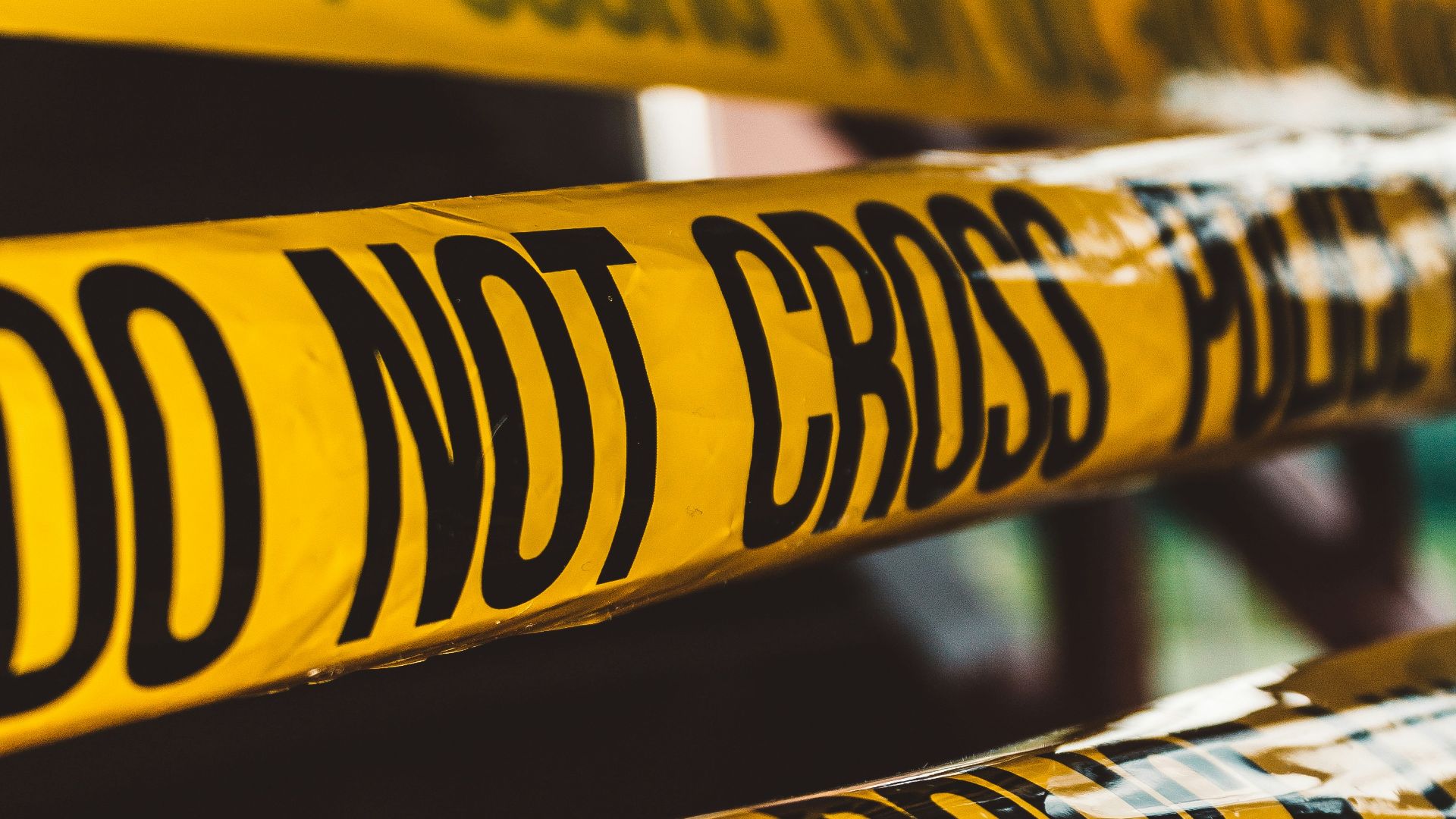 do not cross police barricade tape close-up photography