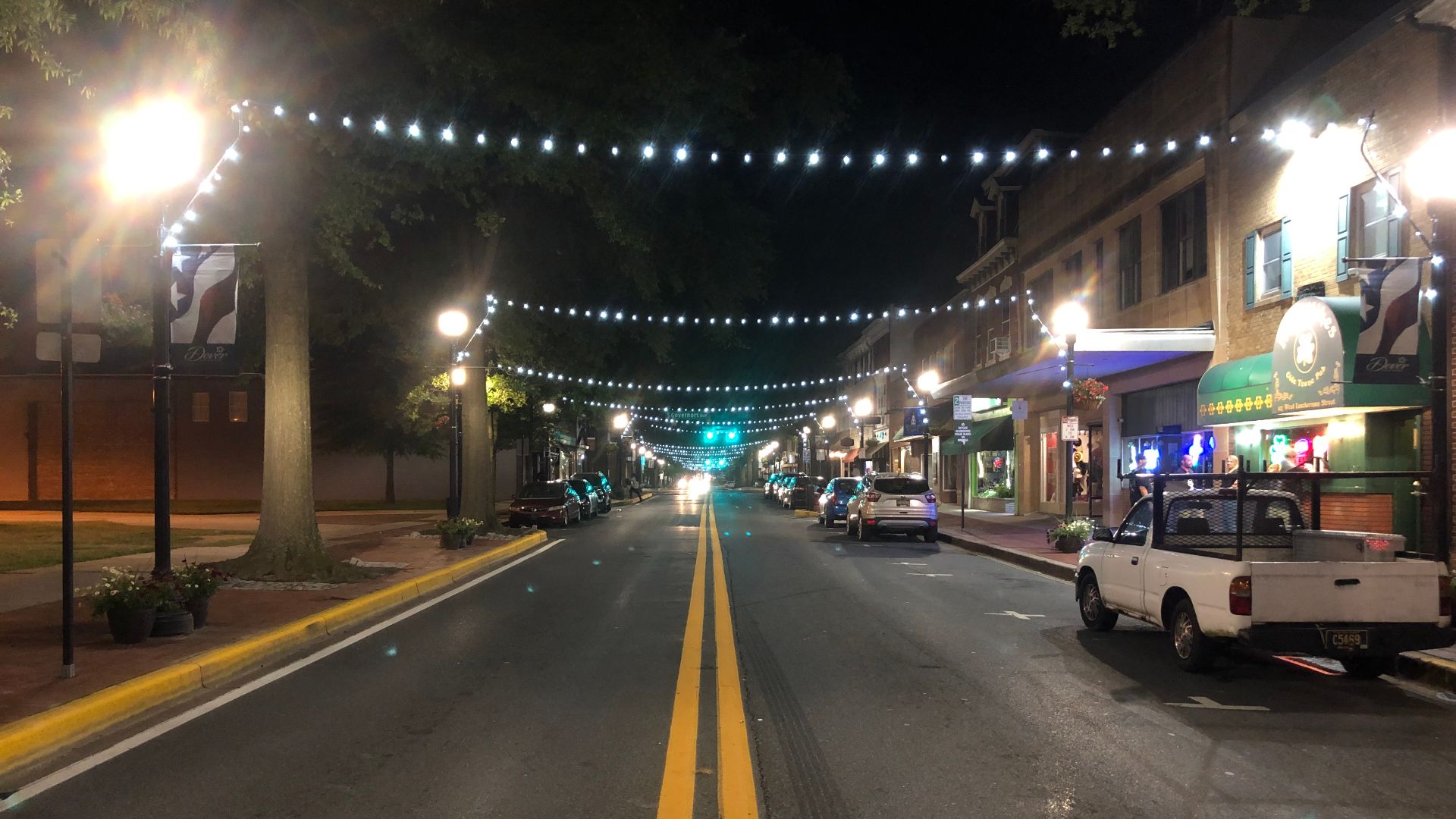 File:2022-07-19 22 29 30 Night view westward along Loockerman Street at Bradford Street in Dover, Kent County, Delaware.jpg