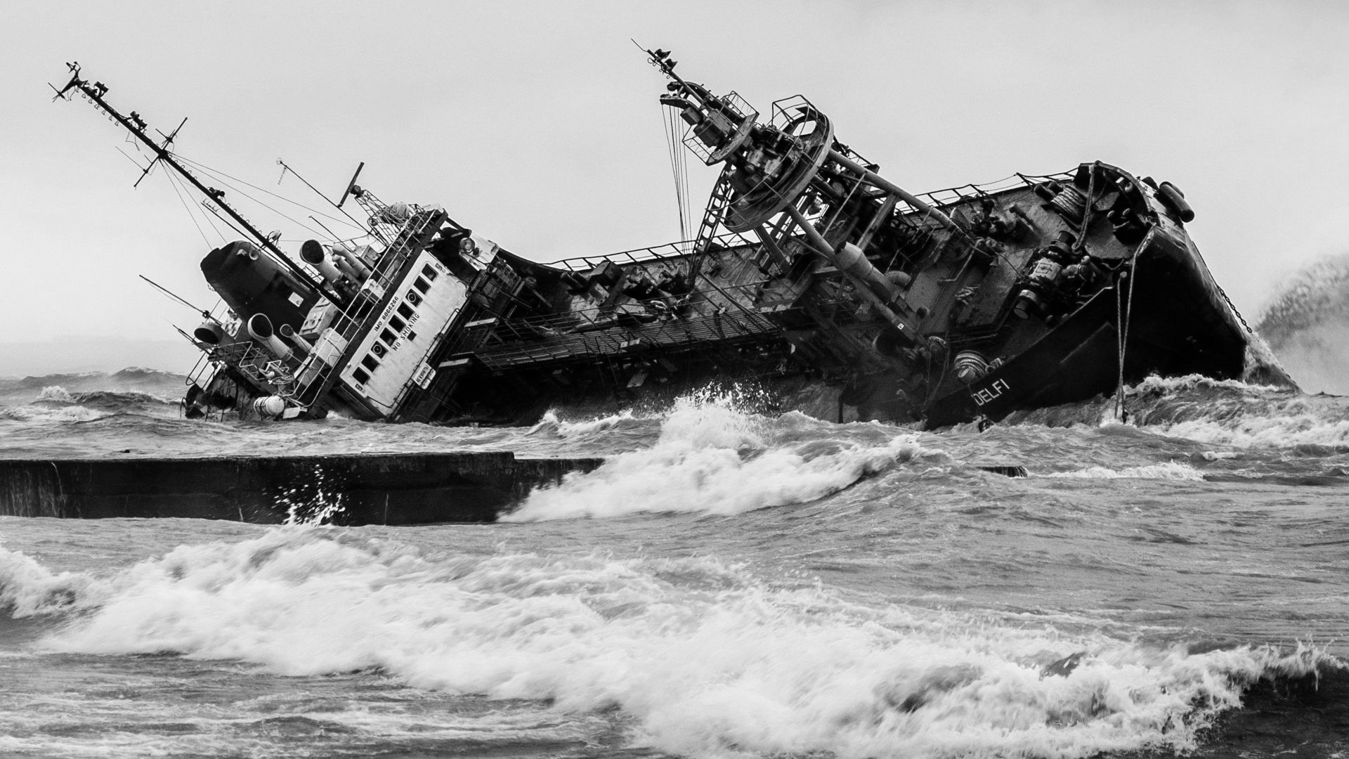 black and brown ship on sea during daytime