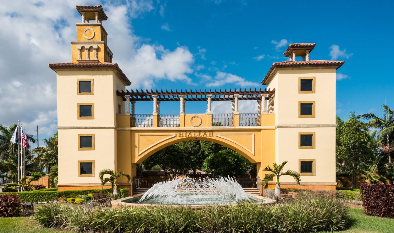 "The entrance to the Municipality of Hialeah. The design came out of a Charrete promoting the City of Hialeah a.k.a athe City of Progressai. The entrance is out of proportion, scale and its details are caricaturesque. It isnaat even an entrance. Yet it represents the desire of Hiealeah residents, politicians and planners to claim the inauthentic in order to craft a vision of progress."