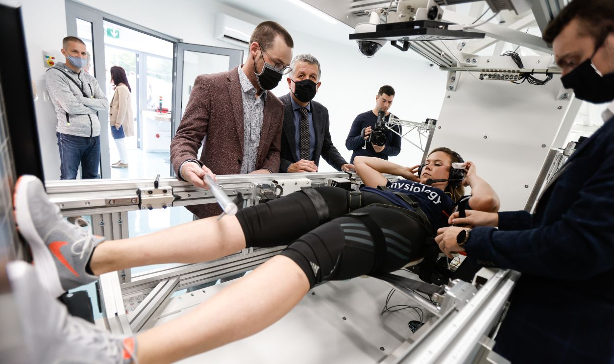 A volunteer is being prepared for a test on the shorthand human centrifuge as it opens at the Gravitational Physiology Laboratory in Planica. A human centrifuge, the result of 20 years of developments in space physiology and medicine by the Jozef Stefan Institute, opened at the Planica Nordic Center, thus making Slovenia one of three members of the European Space Agency besides Germany and France that have a laboratory for biomedical research used in space exploration as well as on Earth. Slovenia joined the European Space Agency's Human and Robotic Exploration programme in 2019.