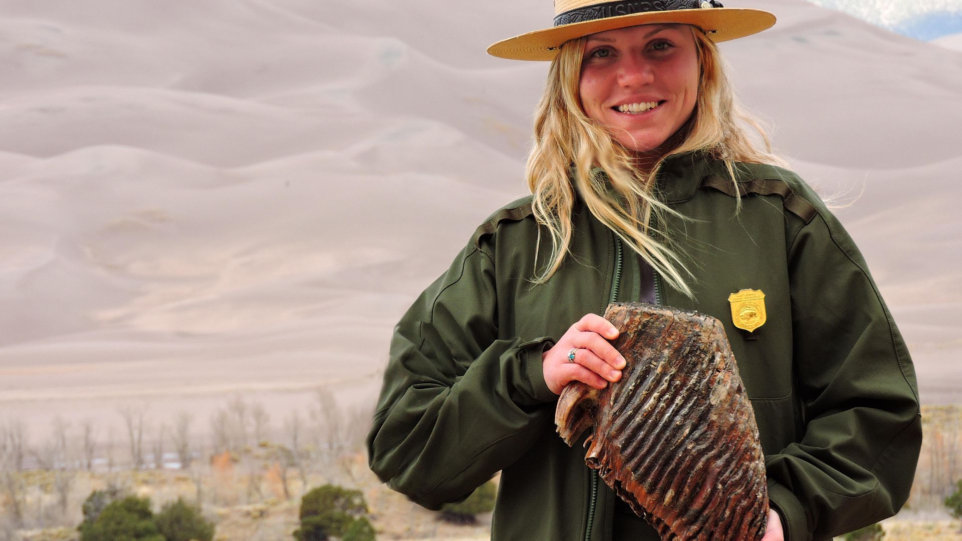 File:Ranger Holding Mammoth Tooth (37125060224).jpg