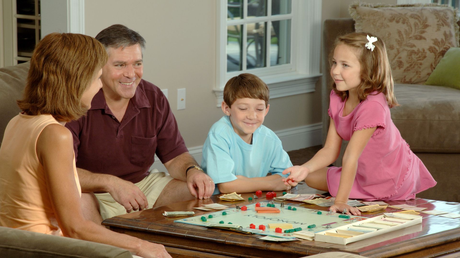 File:Family playing a board.jpg