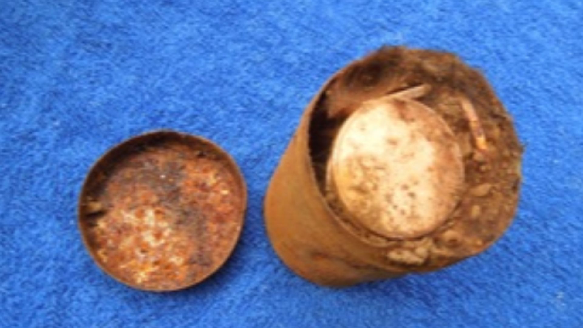File:Saddle Ridge Hoard small rusted can on blue.jpeg