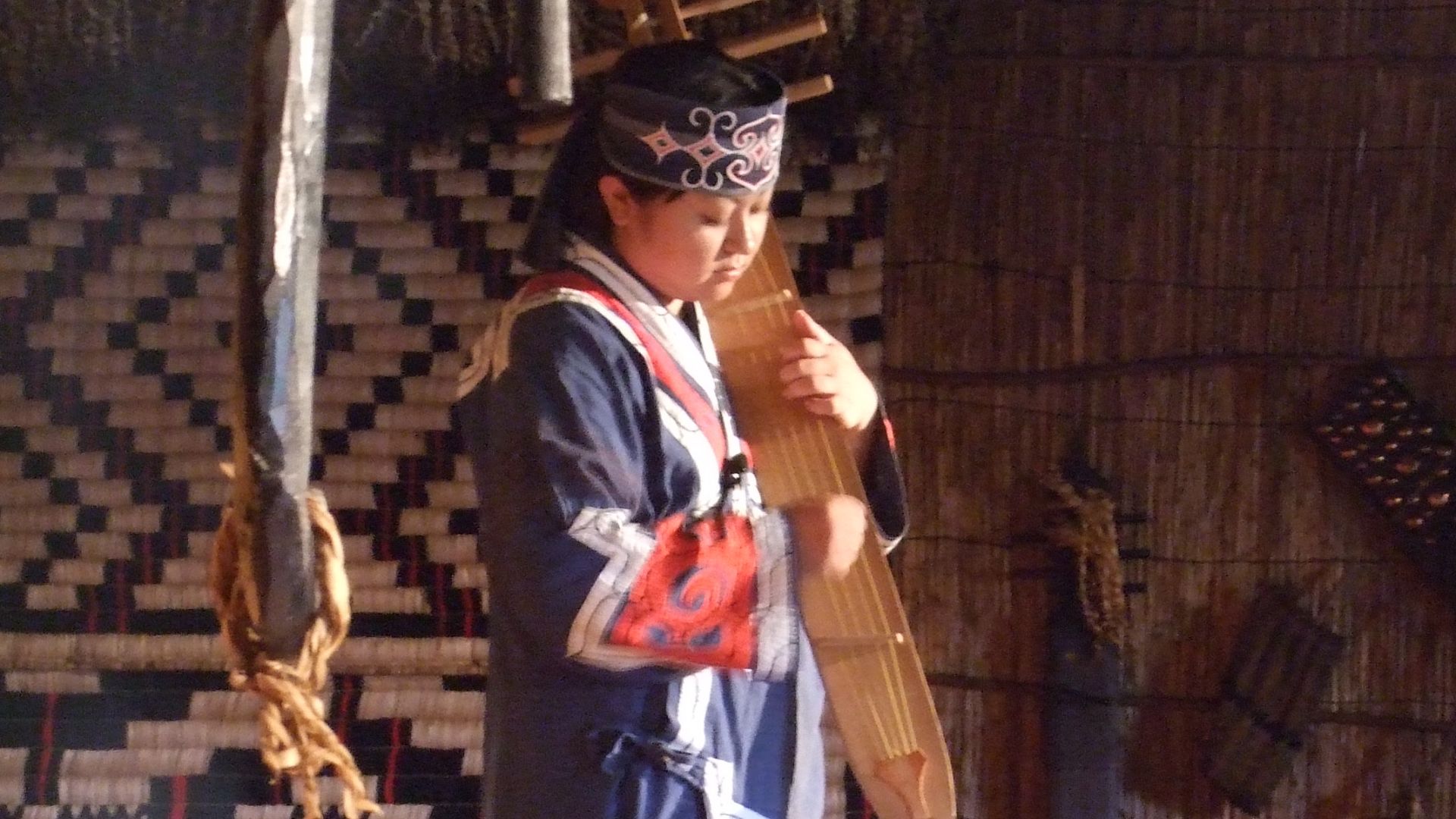 File:Woman playing traditional Ainu instrument.jpg