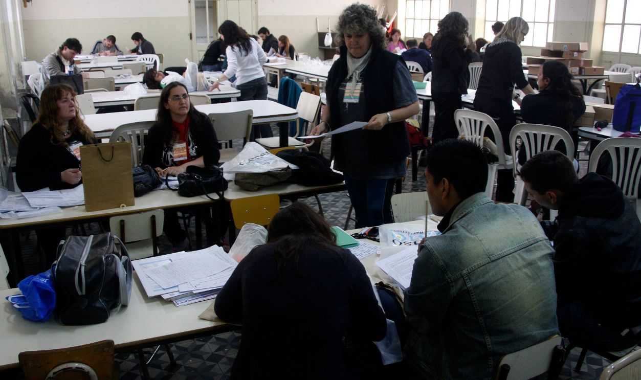 Census' workers gather in a school to prepare themselfs before going out to interview the people, during the National Census Day 2010, on October 27, 2010 in Buenos Aires, Argentina.