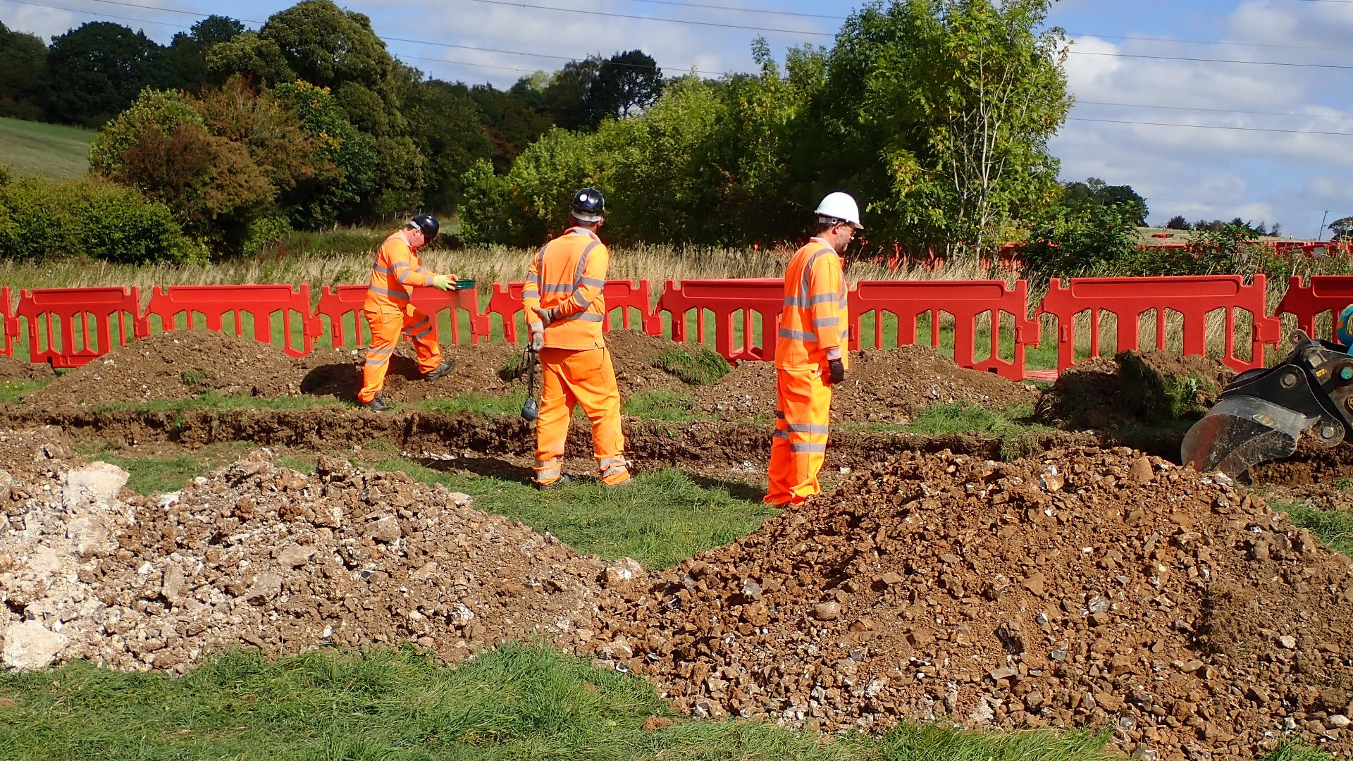 File:Archaeologists on a watching brief.jpg
