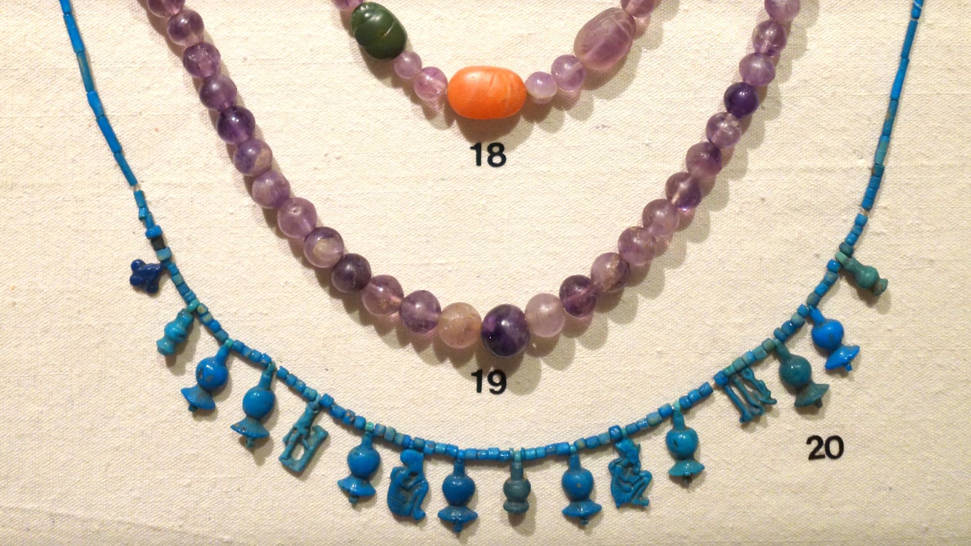 File:Necklaces, Egypt, 18 Middle Kingdom, 2055-1650 BC stones, 19 Dynasty 21 1985-1773 BC amethyst, 20 New Kingdom 1550-1069 BC faience - Albany Institute of History and Art - DSC08199.JPG